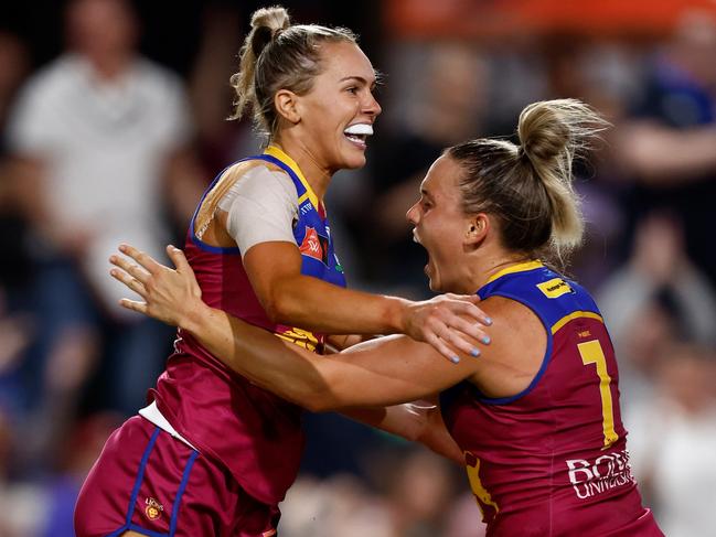 BRISBANE, AUSTRALIA - NOVEMBER 25: Orla O'Dwyer (left) and Ellie Hampson of the Lions celebrate during the 2023 AFLW First Preliminary Final match between The Brisbane Lions and The Geelong Cats at Brighton Homes Arena on November 25, 2023 in Brisbane, Australia. (Photo by Michael Willson/AFL Photos via Getty Images)