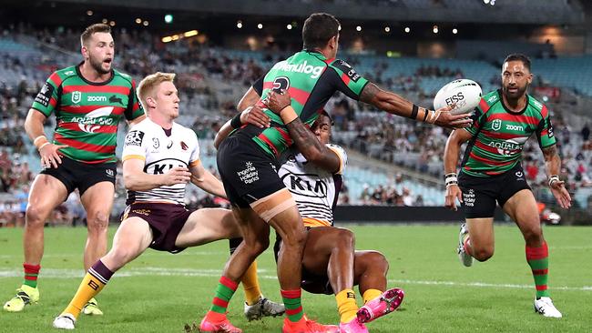 Dane Gagai offloads the ball to Benji Marshall for a try against Brisbane at Stadium Australia. Picture: Getty Images