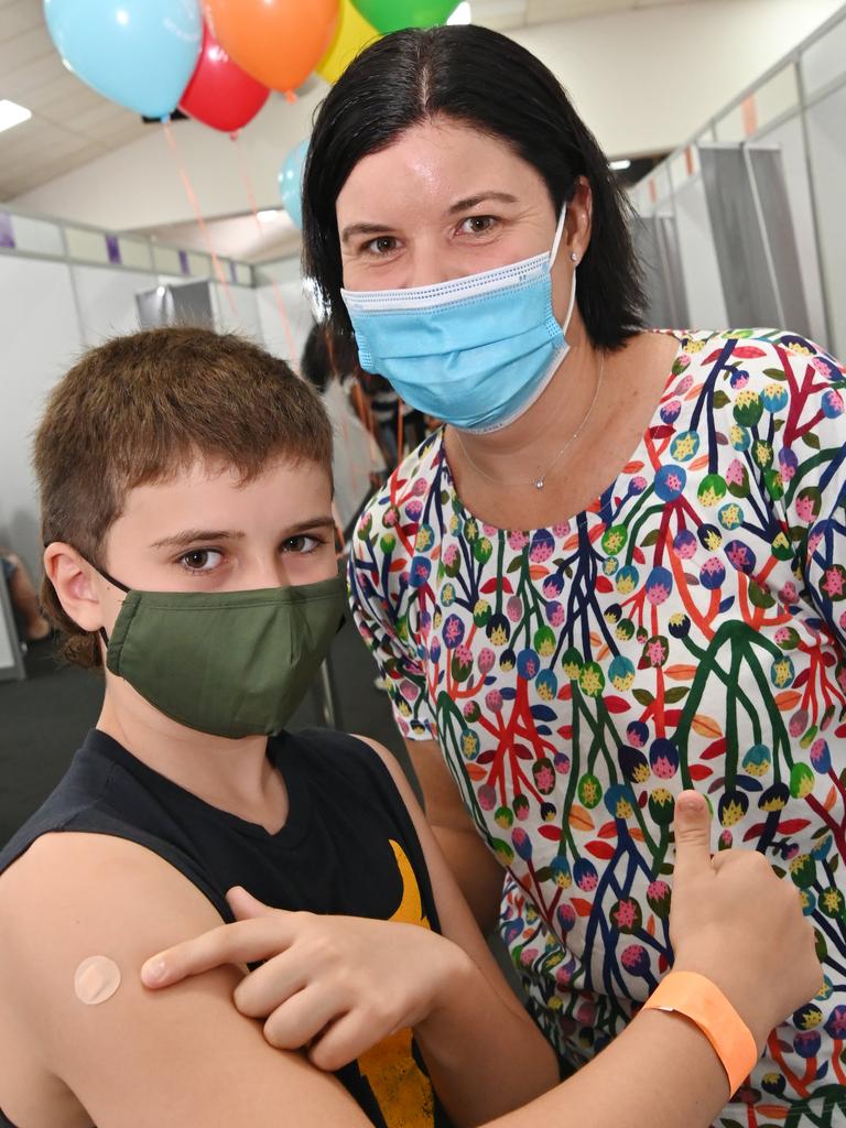 9yr old Henry Archbold after having his vaccine with Health Minister Natasha Fyles NT children aged 5-11 can now get their vaccinations. NT Health will facilitate Picture Julianne Osborne