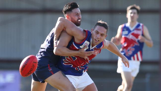 Ryan Goodes wrestles with Peter Heng last year. Picture: David Crosling.