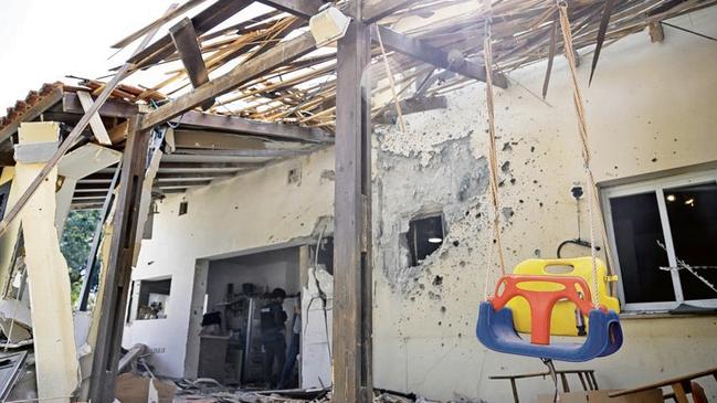 A swing left intact while most this Be’eri house was destroyed by young Hamas terrorists. Five family members were kidnapped and taken to Gaza. Picture: Alexi J. Rosenfeld/Getty Images