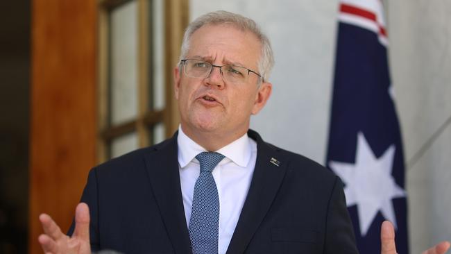 Prime Minister Scott Morrison recommended Australians wear mask but backed away from mandating them. Picture: NCA NewsWire / Gary Ramage