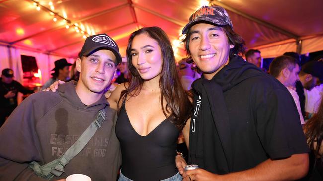 Jag Guthman Chester, Greer Quarterman and Brunson Wallis at the Out 2 Lunch Festival 2025 on Saturday at Broadwater Parklands Southport for Gold Coast at Large. Picture, Portia Large.