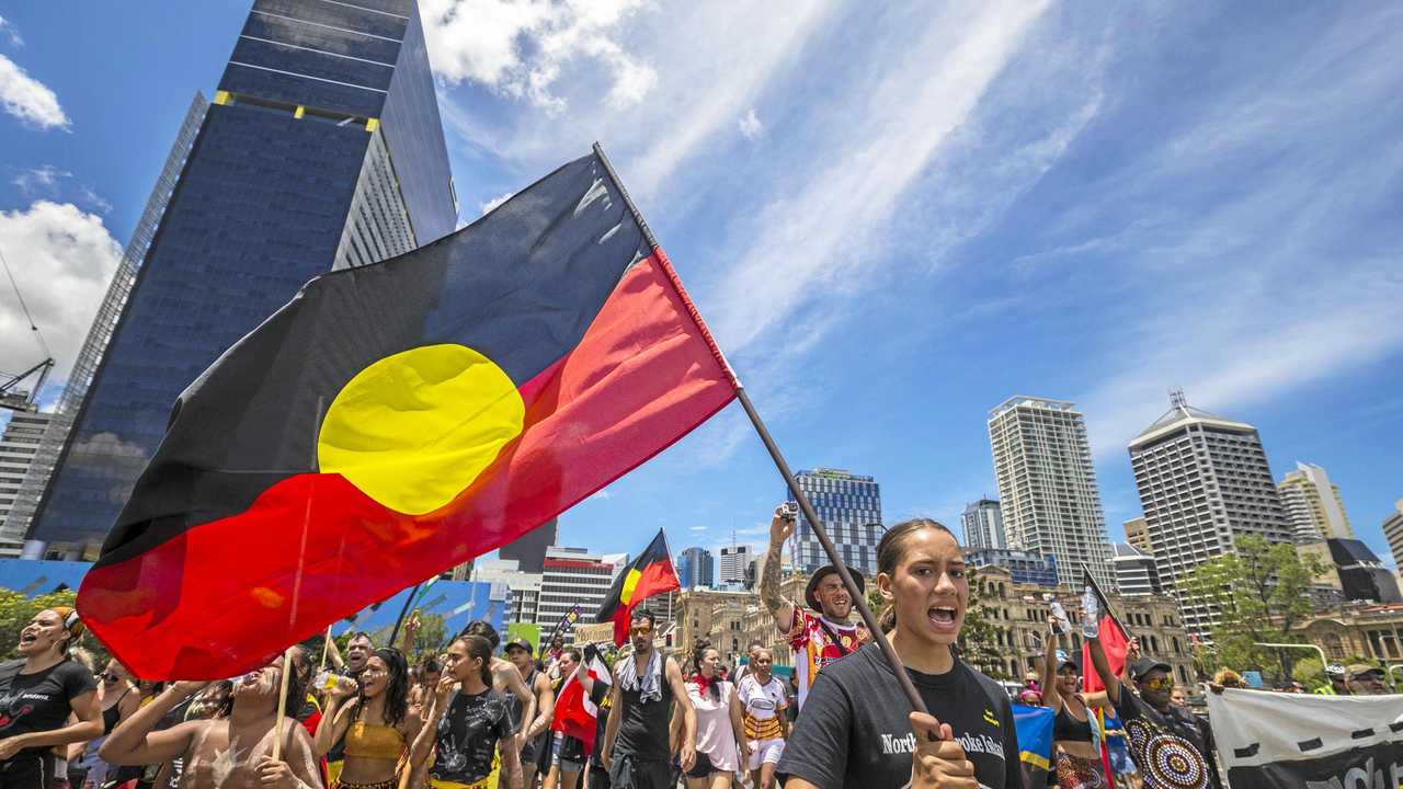 Protesters participate in an Invasion Day march in Brisbane on Australia Day, Friday, January 26, 2018. (AAP Image/Glenn Hunt). Picture: GLENN HUNT