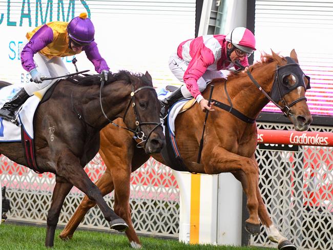 MELBOURNE, AUSTRALIA - SEPTEMBER 04: Damien Oliver riding Superstorm defeats Luke Currie riding Elephant in Race 8, the Clamms Seafood Feehan Stakes, during Melbourne Racing at Moonee Valley Racecourse on September 04, 2021 in Melbourne, Australia. (Photo by Vince Caligiuri/Getty Images)