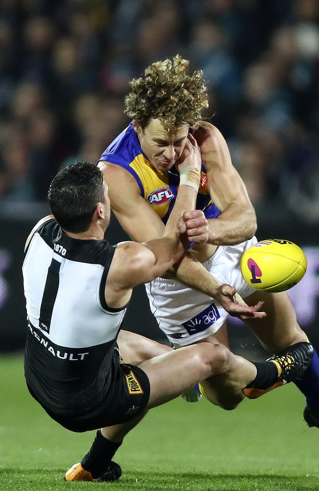 Travis Boak brings down Matt Priddis during last year’s elimination final at Adelaide Oval. Picture: Sarah Reed