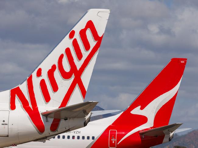 Townsville, Queensland - 28 July 2021: Virgin Australia and Qantas tails on display at Townsville Airport in far North Queensland27 October 2024Kendall HillPhoto - Getty Images