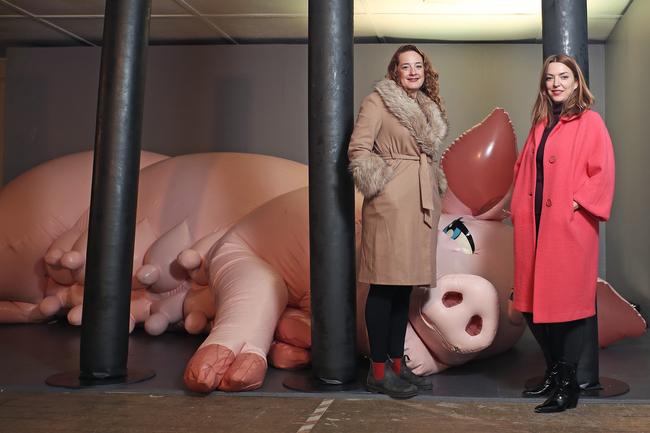 Dark Mofo executive producer Lucy Forge and associate creative director Hannah Fox at Saeborg’s inflatable exhibition at the Avalon Theatre. Picture: LUKE BOWDEN