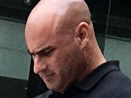 Mario Giovanni Merlo leaves court at Ipswich on March 10, 2020.