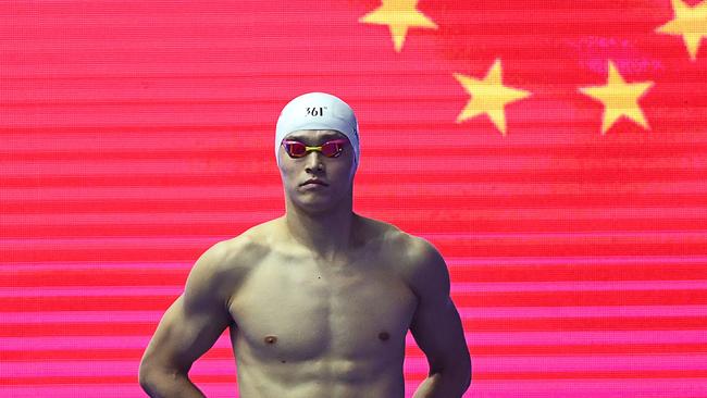 (FILES) In this file photo taken on July 24, 2019 China's Sun Yang prepares for the final of the men's 800m freestyle event during the swimming competition at the 2019 World Championships at Nambu University Municipal Aquatics Center in Gwangju, South Korea. - Two-to-eight-year suspension: Chinese swimmer Sun Yang, a star in Asia, faces major consequences on November 15, 2019, before the Court of Arbitration for Sport (CAS) for an incredible anti-doping test in which he destroyed his sample with a hammer. Three-time Olympic champion in London-2012 and Rio-2016 and eleven world titles between 2011 and 2019, Sun Yang "will be present" at the hearing in Montreux, Switzerland. (Photo by Manan VATSYAYANA / AFP)