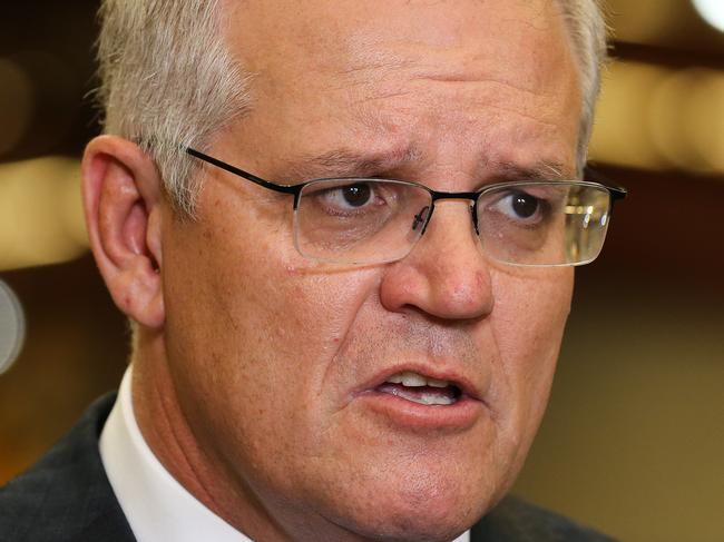 SYDNEY, AUSTRALIA - NewsWire Photos, DECEMBER 17 2021: Prime Minister Scott Morrison visits Opie Manufacturing and addresses the media during a press conference in Sydney. Picture: NCA Newswire / Gaye Gerard