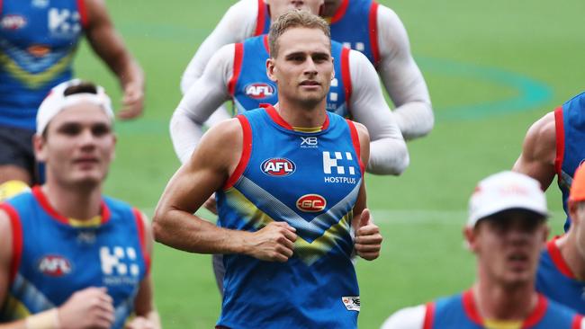 Suns player Will Brodie trains with teammates. Picture: Jason O'Brien