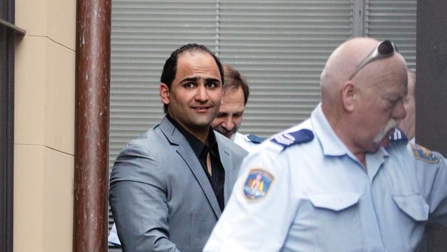 Mohammed 'Blackie' Fahda being taken back to prison after his murder trial.