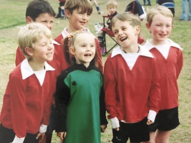 Ellie Carpenter swimming in a goalie jumper in her early playing days. Picture: Supplied