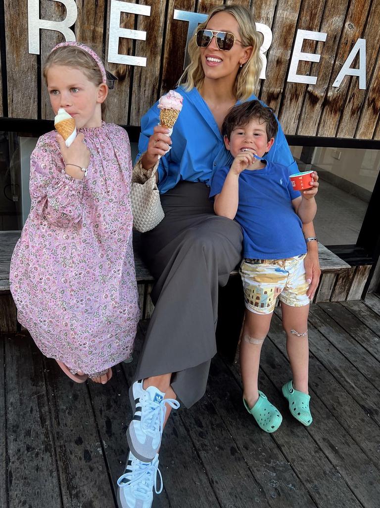 Phoebe Burgess, centre, with her two children.