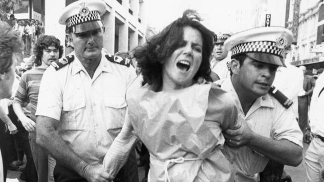 Opponents will note the premier’s attacks on the democratic right to protest. Above, police arrest woman in Adelaide St, Brisbane, during a 1978 Right to March protest.