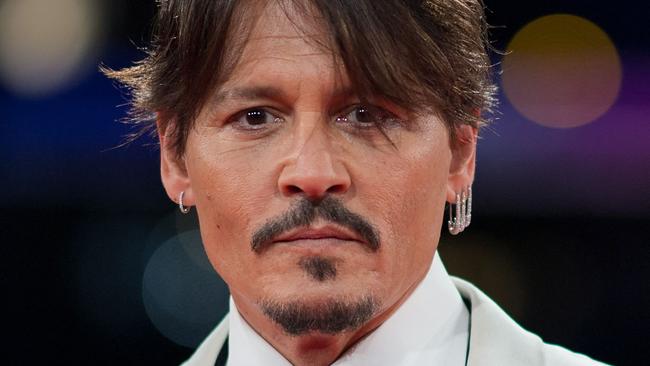 Johnny Depp has signed a rumoured $30 million deal with Dior. Picture: LOIC VENANCE / AFP