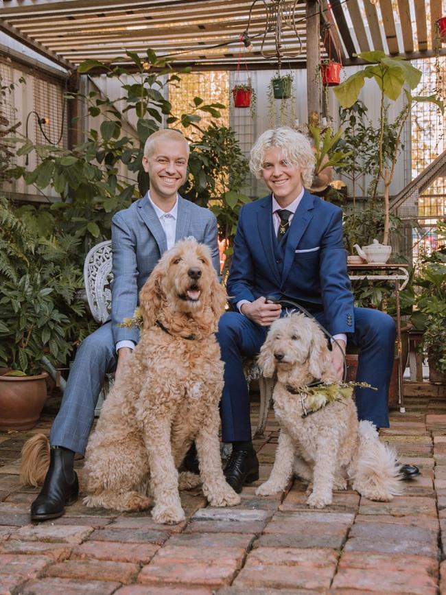 Cub Sport's Sam Netterfield and Tim Nelson with their dogs Missy and Evie who formed the bridal party for their August 2018 wedding. Picture: Supplied