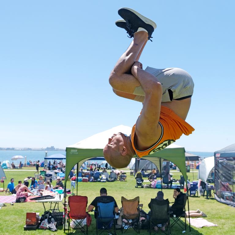 Eastern Beach Geelong Cup Day crowds. Kevin Carlo tricking at the beach Picture: Mark Wilson