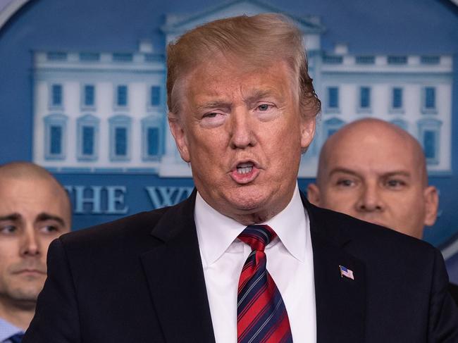US President Donald Trump addresses the press in the White House briefing room January 3, 2019 in Washington, DC. - President Trump gave a statement on the government shutdown and border wall in what was his first time behind the podium in the White House briefing room. (Photo by NICHOLAS KAMM / AFP)