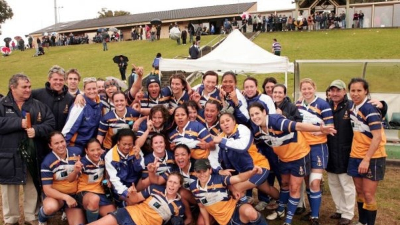 Caroline Layt, pictured at the back, in headgear with finger raised, celebrates with the 2007 Sydney women's 1st XV ARU National champions.