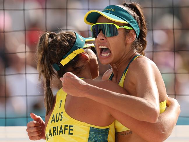 PARIS, FRANCE - AUGUST 04: Taliqua Mariafe Clancy and Mariafe Artacho del Solar of Team Australia react during a Women's Round of 16 match against Team Brazil on day nine of the Olympic Games Paris 2024 at  on August 04, 2024 in Paris, France. (Photo by Elsa/Getty Images)