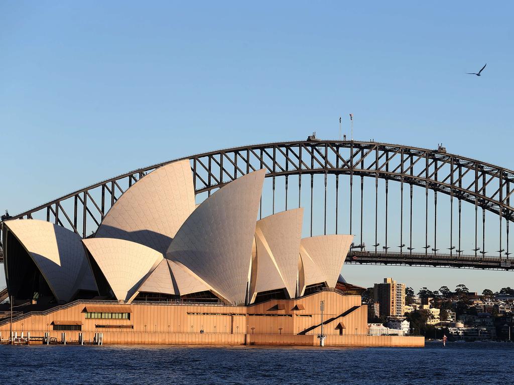 The Sydney Opera House foreshadows the Harbour Bridge as forecasts suggest it will be hotter in Sydney today than it is mid summer in London. Picture: Carly Earl