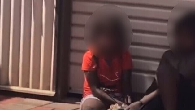 A West Australian man has been charged with three counts of aggravated assault after a video emerged of three Aboriginal children tied up with cable ties in a front yard. Picture: Instagram