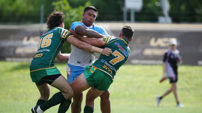 Pride's Matolu Laumea crashes through the Cairns defence in the pre-season trial match between the Northern Pride and the Cairns Foley Shield side, held at Petersen Park, Edmonton. PICTURE: BRENDAN RADKE