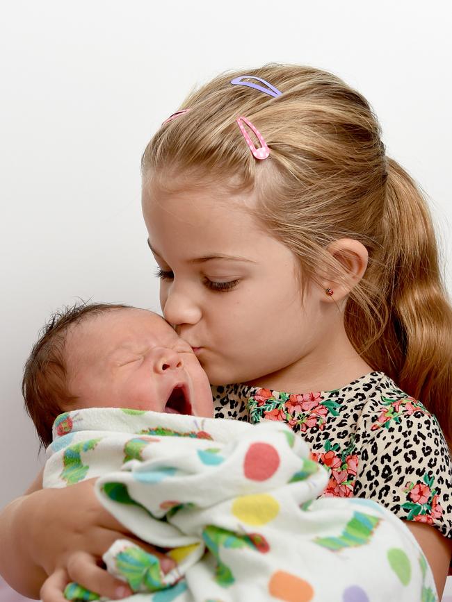 Jessica Duncan, 4, kisses her baby brother, Alex. Picture: Naomi Jellicoe