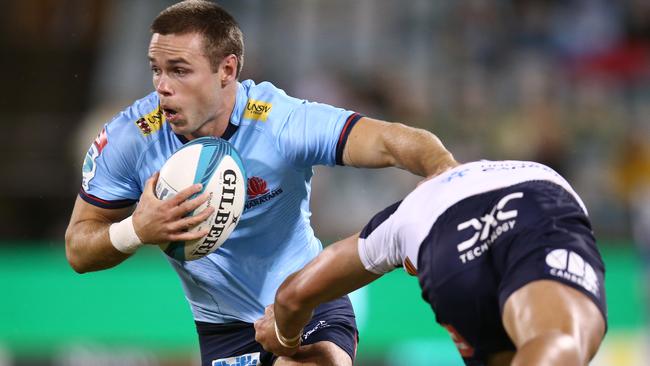 Will Harrison of the Waratahs runs the ball during a Super Rugby Pacific match against the ACT Brumbies in 2022. Picture: Getty Images