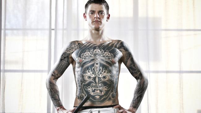 Jockey Nick Hall practising yoga at One Hot Yoga, South Yarra. Pic: Michael Klein