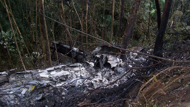 Police pictures of the site of the plane crash at Lockhart River, Cape York. The Fairchild Metroliner III was on a May 7, 2005 flight from Bamaga to Lockhart River when it crashed, killing all 15 aboard.