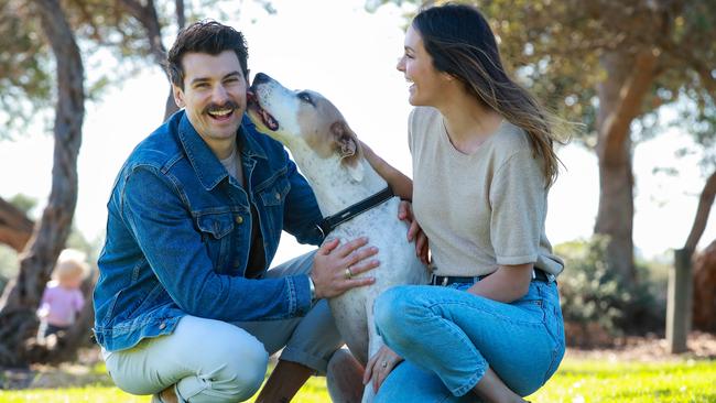 Matty J and Laura love their rescue angel Buster. Picture: Justin Lloyd