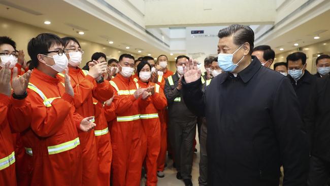 Chinese President Xi Jinping visits workers in east China's Zhejiang Province. Picture: AP.