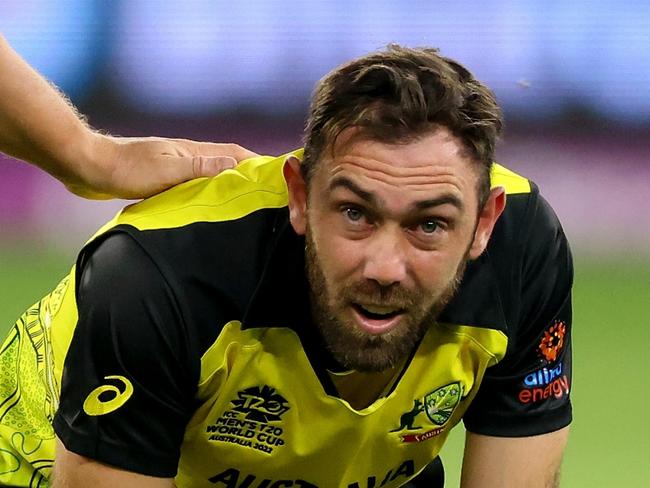 PERTH, AUSTRALIA - OCTOBER 25: Glen Maxwell of Australia reacts after getting hit by the ball as Aaron Finch of Australia checks on him during the ICC Men's T20 World Cup match between Australia and Sri Lanka at Perth Stadium on October 25, 2022 in Perth, Australia. (Photo by James Worsfold/Getty Images)