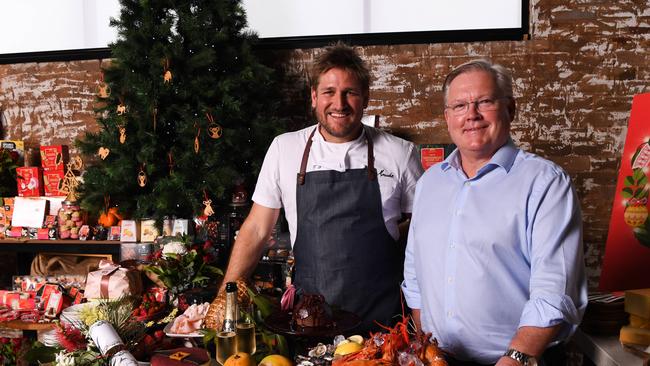 Coles ambassador Curtis Stone and Coles’ outgoing chief executive, Steven Cain.