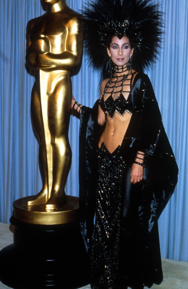 There’s a fine line between incredible and terrible ... and singer-turned-actress Cher proves she’s incredible every time. Here she is pictured at the 1986 Oscars. Picture: Supplied / File