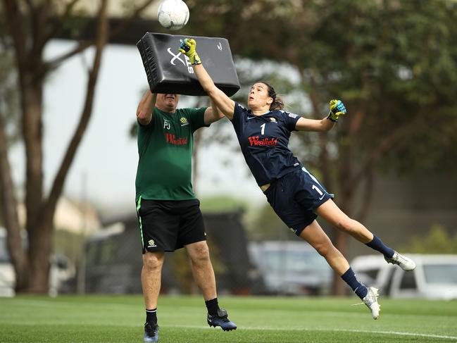 SYDNEY, AUSTRALIA - NOVEMBER 06: Lydia Williams dives to punch the ball away during a practice drill at an Australia Matildas training session at Wilson Park on November 6, 2018 in Sydney, Australia. (Photo by Mark Kolbe/Getty Images)