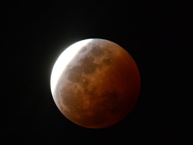 The lunar eclipse with a blood red moon seen in Queensland. Picture: Evan Morgan