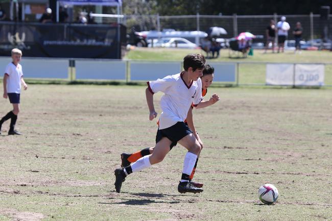 The Premier Invitational football tournament on the Gold Coast. TSS v Brisbane Roar under-13s in action. Picture: Mike Batterham.
