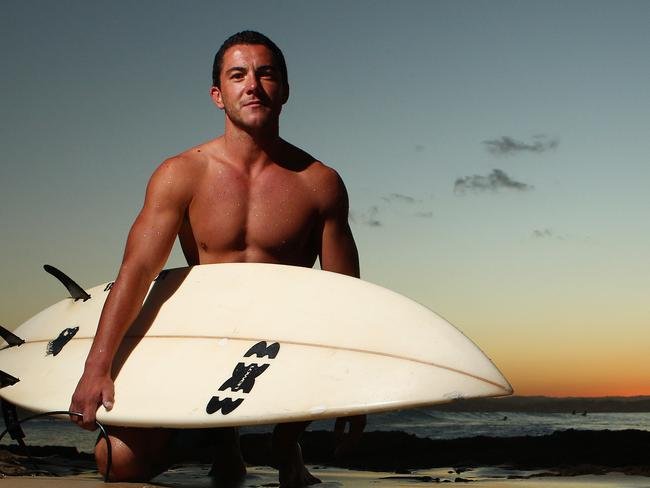 English backpacker Chris Short is having a great time surfing on the Gold Coast on working  holiday visa. He works part time and is furious at looming 32.5 cent tax to be paid by backpackers.Picture by Scott Fletcher