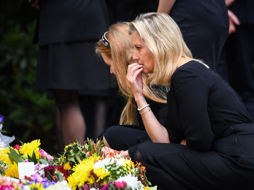 An emotional Sophie, Countess of Wessex look at the flowers placed outside Balmoral Castle. Picture: AFP