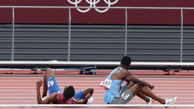 They turned to each other after falling. Picture: Giuseppe Cacace / AFP