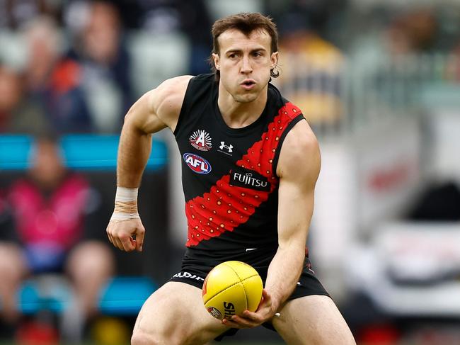 MELBOURNE, AUSTRALIA - APRIL 25: Andrew McGrath of the Bombers in action during the 2024 AFL Round 07 match between the Essendon Bombers and the Collingwood Magpies at the Melbourne Cricket Ground on April 25, 2024 in Melbourne, Australia. (Photo by Michael Willson/AFL Photos via Getty Images)