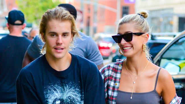 Justin Bieber and fiancee Hailey Baldwin all smiles out walking n New York.