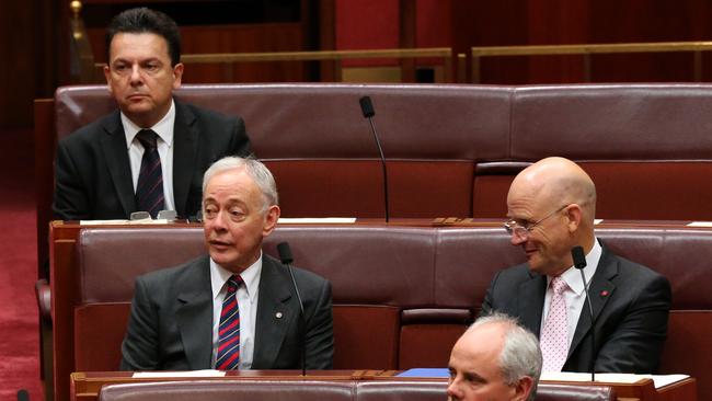 Bob Day, sitting next to David Leyonhjelm in 2016, says his former parliamentary colleague is a “good friend”.