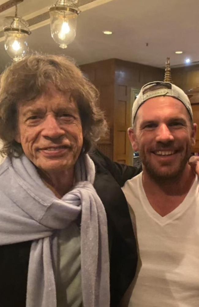 Aaron Finch with Rolling Stones' Mick Jagger