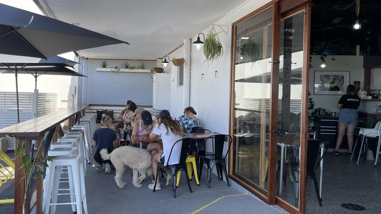 The outdoor dining area at Espresso Moto in Mermaid Waters.