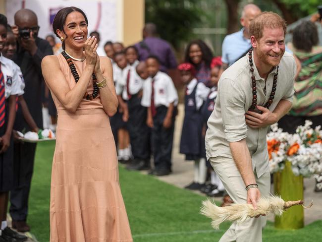 Prince Harry, Duke of Sussex, and Meghan, Duchess of Sussex, in Nigeria. Picture: Kola Sulaimon/AFP